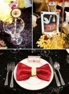 the table is set with silverware and red bow tie napkins, candy bar sign