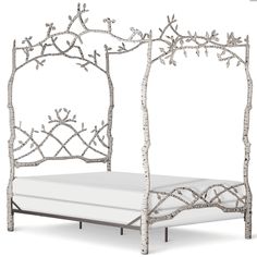 a white bed with branches on it and the words complete bed queen written in english