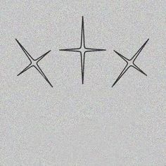 three crosses are drawn in the sky on a gray background