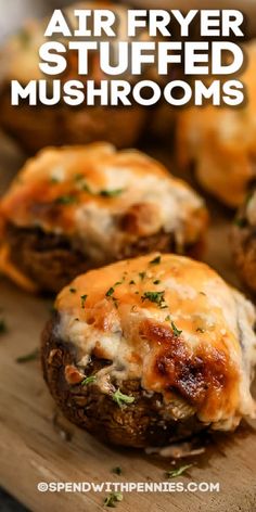 an air fryer stuffed mushrooms on a cutting board