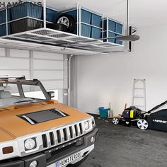 an orange jeep is parked in a garage