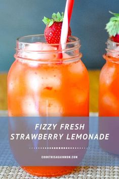 two mason jars filled with fresh strawberry lemonade