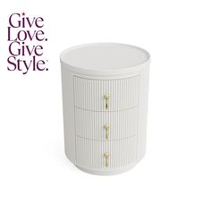 a white cabinet with gold handles and knobs on the front, next to a give love style sticker