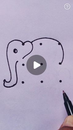 someone is drawing an elephant on paper