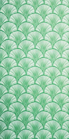 an art deco wallpaper pattern with green and white fan shaped design on it's side