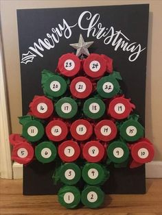 a christmas tree made out of toilet paper and rolled up with the numbers on it