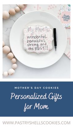 a mother's day cookie on a plate with the words, personalized gifts for mom