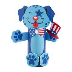 a blue dog with an american flag hat and stars on it's head is standing upright