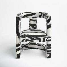 a black and white zebra print chair on a white background