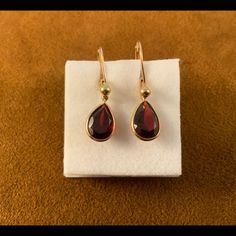 14k Yellow Gold Pear Shape Dangle Garnet Earrings. Have 14k Leverbacks And Garnets Are Bezel Set. Total Length Is About 1”. Pear Shape Garnets Are About 9 By 7 Mm. In Good Condition. Garnets Are A Good Clean Dark Red Color. Januarys Birthstone. Dark Red Color, Garnet Earrings, Pear Shape, Bezel Setting, Red Gold, Dark Red, Red Yellow, Red Color, Birthstone