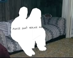 two people standing in front of a couch with the words please don't replace me on it