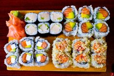 sushi platter with various types of sushi on it