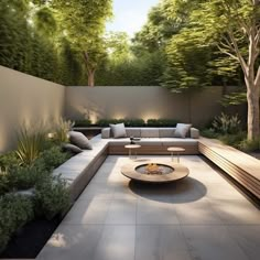 an outdoor living area with couches, tables and trees