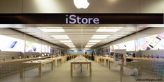 the inside of an apple store with lots of tables