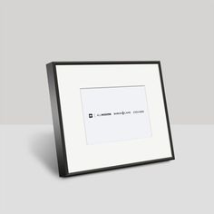 a black and white photo frame with an inscription