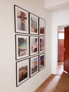 there are many pictures hanging on the wall in this room with wood floors and hard wood flooring