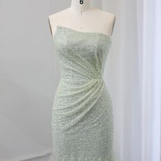 Upgrade your wedding party look with our Sparkly Sage Green Mermaid Evening Dress. The shimmering fabric and mermaid silhouette will make you stand out while the sage green color adds a touch of elegance. Perfect for formal events, this dress is sure to make you feel like a true mermaid. window.adminAccountId=244214477; Green Mermaid Gown With Sweep Train, Green Fishtail Mermaid Dress With Fitted Bodice, Glamorous Green Mermaid Gown, Mermaid Wedding Dress With Sweep Train, Green Mermaid Dress With Fitted Bodice, Green Mermaid Gown For Prom Season, Glamorous Green Mermaid Hem Gown, Wedding Mermaid Dress With Sweep Train, Green Mermaid Hem Gown For Prom Season