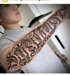 a person with a tattoo on their arm