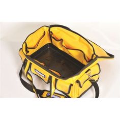 a yellow and black bag sitting on top of a white table