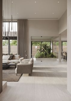 a living room filled with lots of furniture next to tall windows and sliding glass doors