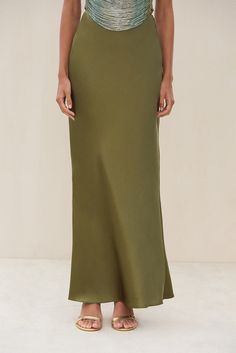 A bias cut maxi slip skirt crafted from silk with slight stretch. — Maxi length — Made from silk — Bias cut — Pull on style Bias Cut Maxi Skirt, Silk Bias Skirt, Maxi Slip Skirt, Bias Skirt, Silk Maxi Skirt, Bias Cut Skirt, Swimming Bag, Autumn Sales, Slip Skirt