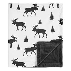 a black and white blanket with moose silhouettes on it