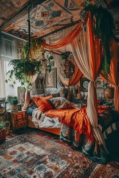 a bedroom with an orange canopy bed and lots of plants