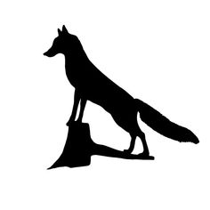 a black and white silhouette of a fox standing on a tree stump with its tail extended