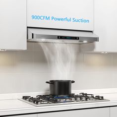 a stove top with a pot on the burner and a sign above it that says 9000cm powerful suction