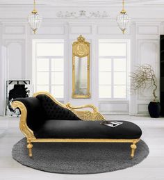 a black and gold chaise lounge in a white room