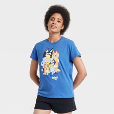 The Women's Bluey Short Sleeve Graphic T-Shirt - Blue makes a great addition to your casual wardrobe. It features fun graphics from the tv show - Bluey, that’s sure to put a smile on your face. Perfect for casual outings or everyday wear, this Women's Bluey Short Sleeve Graphic T-Shirt - Blue is a great pick. Funny Blue Crew Neck Top, Funny Blue Short Sleeve Top, Fun Blue T-shirt With Character Print, Funny Blue T-shirt With Character Print, Funny Blue T-shirt With Cartoon Print, Bluey Shirt, Fun Graphics, Swiftly Tech Short Sleeve, School Birthday