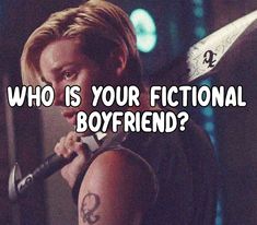 a man holding a microphone with the words who is your fictional boyfriend?