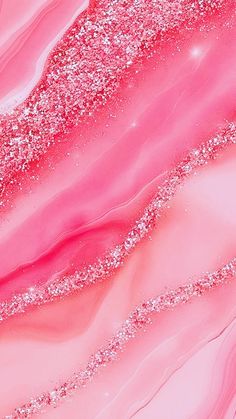 an abstract pink and white background with glitter