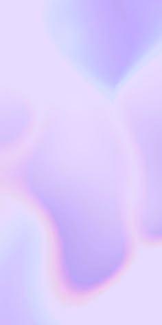 an abstract blurry background with pink and purple colors