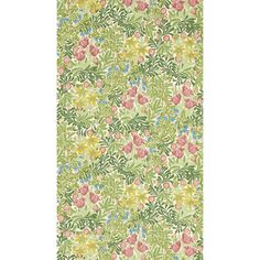 a green and pink floral wallpaper with lots of flowers on the bottom half of it