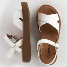 These Girls Soda Sandals are perfect for summer with their cute and stylish design. They offer a fashionable touch to any outfit. The perfect blend of comfort and style, these sandals are a must-have for any young fashionista. Soda Sandals, Flat Heel Boots, Stance Socks, Cut Clothes, American Jeans, Beanie Style, Sneaker Slippers, Girls Sandals, Boots And Sneakers