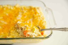 a casserole dish with chicken and vegetables in it