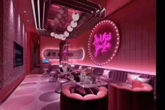 a room with pink walls and round tables in the center is lit by neon lights