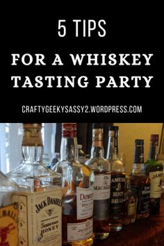 bottles of whiskey sitting on top of a wooden table with the words 5 tips for a whisky tasting party