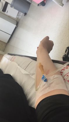 a person with an iv attached to their leg