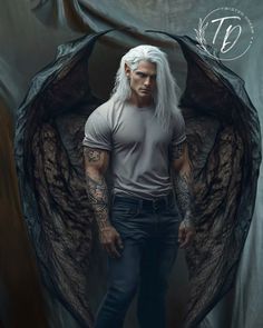 a man with white hair and tattoos standing in front of an angel's wings