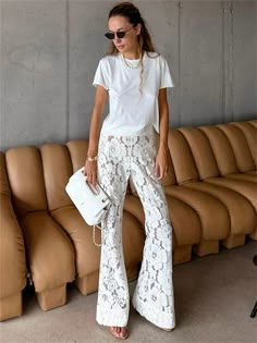 SPECIFICATIONSBrand Name: TOSSYStyle: Sexy & ClubAge: MIDDLE AGEOrigin: Mainland ChinaCN: ZhejiangSeason: Spring/SummerWaist Type: lowDecoration: SplicedElasticity: Slight StrechFabric Type: blendedPattern Type: PatchworkPant Style: Wide leg pantsMaterial: POLYESTERFit Type: regularLength: Ankle-Length PantsPlace Of Origin: China (mainland)Closure Type: Elastic WaistGender: WOMENFront Style: FlatChoice: yessemi_Choice: yes White Lace Pants Outfit, White Flare Pants, White Flares, Lace Pants, Pants Summer, Festival Style, Long Trousers, Flare Trousers, Pant Style