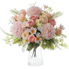 a vase filled with pink and white flowers