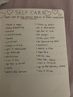 a notepad with writing on it that says i love self care and other things