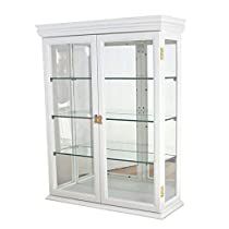 a white display case with glass doors and gold trimmings on the bottom shelf