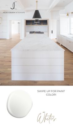 a white kitchen with the words swipe up for paint color