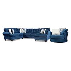 a blue sectional couch with pillows on it