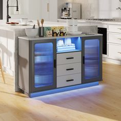 This all-in-one bar cabinet brings sophistication and functionality to your home bar, living room, or dining area. Crafted from engineered wood with a neutral finish, it features plenty of storage space with cabinets and drawers for all your entertaining essentials. This piece is equipped with over 20 LED light color options, allowing you to set the mood with a simple press of a button. A 3-in-1 charging station (wireless, wired USB port, and Type-C port) offers convenient and fast charging opti Home Bar Living Room, Bookshelf Brackets, Bar Living Room, Maximalist Home, Sewing Furniture, Globe Decor, Etagere Bookcase, Entertaining Essentials, Cozy Room Decor