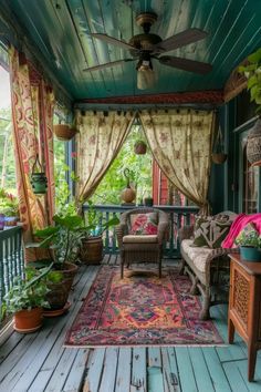 the porch is decorated with plants and furniture