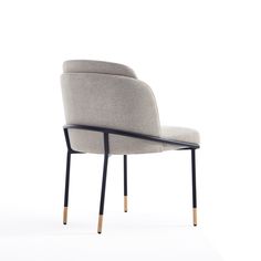 an upholstered chair with black legs and a light gray seat